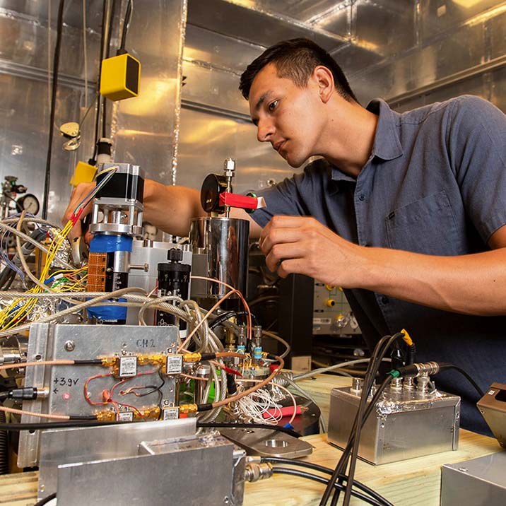 Summer REU Student conducting research